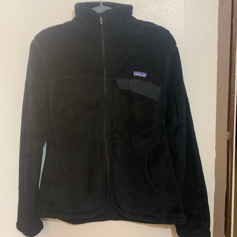 Patagonia - zip up sweater in black (L)